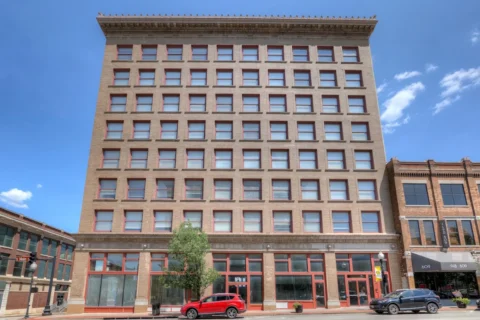 exterior of historic 1913 Frisco Building, now the Frisco Station Lofts